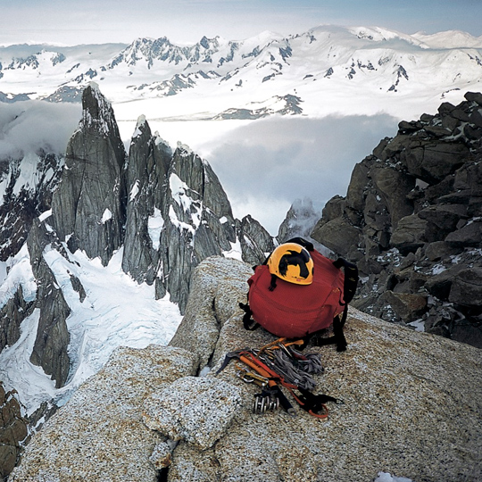 Flying raven, burning sun. Potter's partners on the summit of Fitz Roy after climbing Supercanaleta. Photo: Dean S. Potter